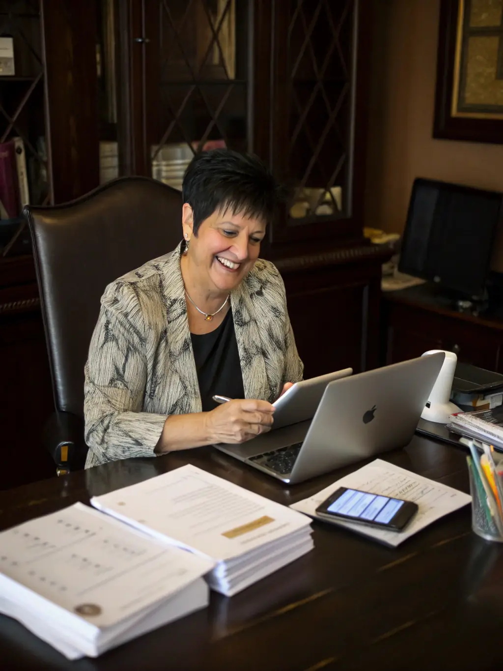 A professional photo of a satisfied Shopify store owner giving a testimonial about the positive impact of Omegacube Agency's SEO services on their business, emphasizing increased revenue and brand visibility.